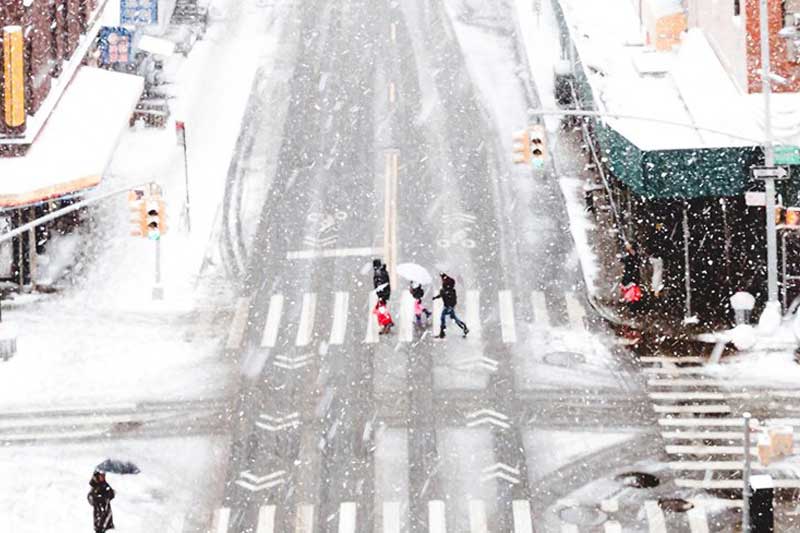 Overview photo of a snow blown street.